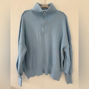 Blue half zip sweater